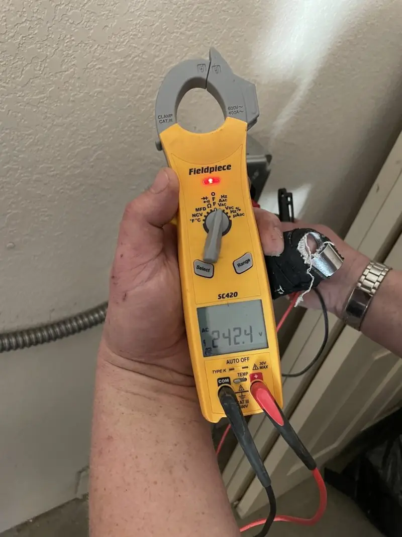 Voltage testing with clamp meter during Aluminum Wiring Replacement in Fox